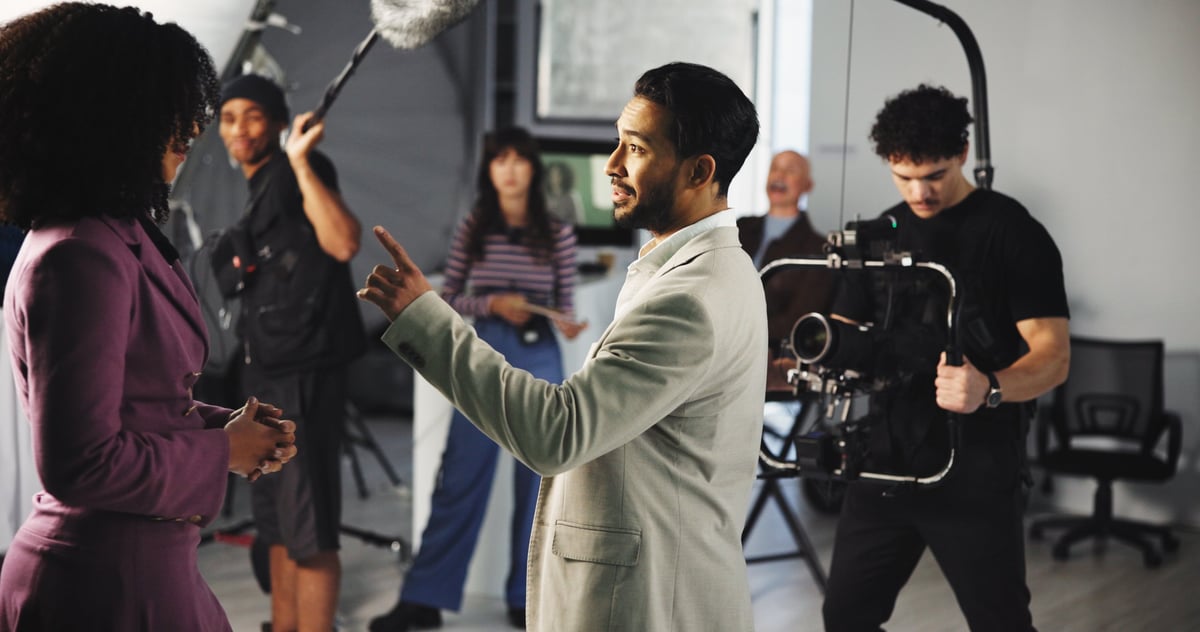 Man, actor or camera with scene in production studio for action, take or roll play on set